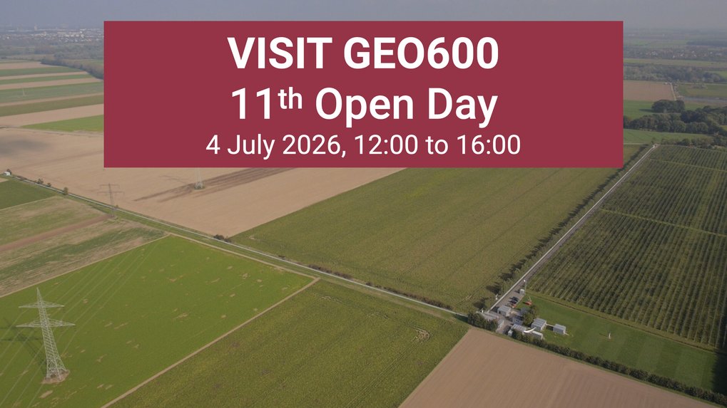 Aerial picture of a landscape with many fields and an L-shaped structure. At its vertex are several buildings and a small parking lot. On top of the image is a red box with text in white letters reading “Visit GEO600, 11th Open Day, 4 July 2026, 12:00 to 16:00”