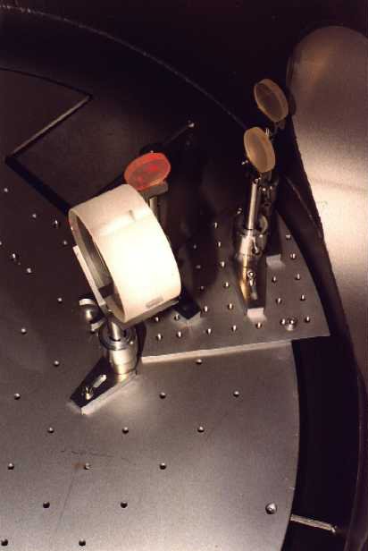 Beam director mirror and pick-up mirror for the transmitted beam; on the right hand side the pick-ups for the beam from MMC1c.