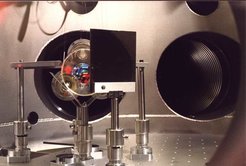 A look through the camera viewport: In front the stainless steel mirror, then mirror MMC2b, behind it the reaction mass with coils; in the back the modecleaner tubes.
