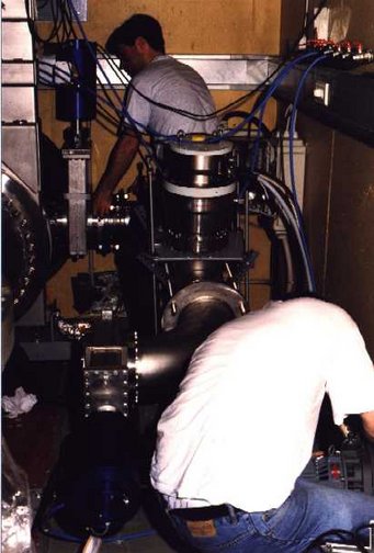 Kasem and Walter are installing a new turbopump. Kasem and Walter are installing a new turbopump.