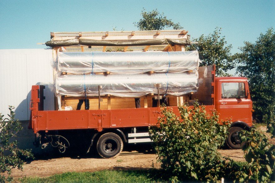 The delivery of new tubes in front of the eastern end-house.