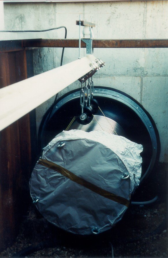 The tube is pushed into the trench.