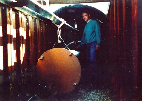 Alexander in the trench pushing the tube.