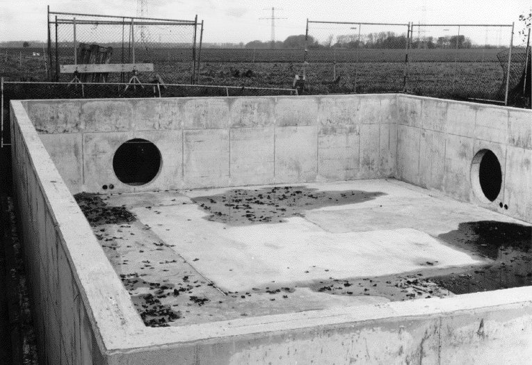 Central house, looking north. Notice the separate foundations for the pumps (far right corner) and the tank cluster (middle).